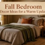 A fall bedroom with layered bedding in warm colors and textures.